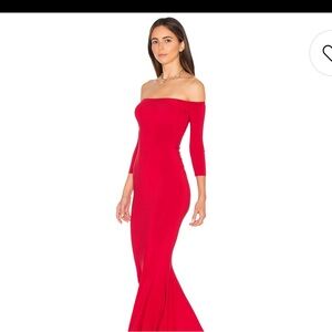 Beautiful dark red body con maxi dress off the shoulder with fishtail hem. NWT